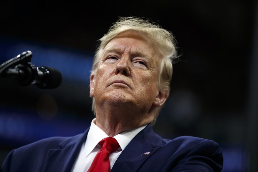 President Donald Trump speaks at a campaign rally at the Target Center, Thursday, Oct. 10, 2019, in Minneapolis. (AP Photo/Evan Vucci)