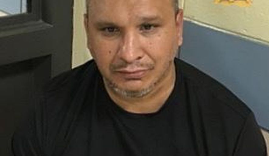 This undated photo provided by Louisiana State Police shows Reymundo Luis Valdez, accused of killing two people in Houston and who has been arrested in a Louisiana casino. (Louisiana State Police via AP)