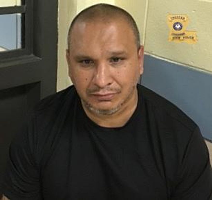 This undated photo provided by Louisiana State Police shows Reymundo Luis Valdez, accused of killing two people in Houston and who has been arrested in a Louisiana casino. (Louisiana State Police via AP)