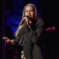 FILE - This Dec. 8, 2018 file photo shows Natalie Merchant performing at Cyndi Lauper&#39;s 8th Annual &amp;quot;Home for the Holidays&amp;quot; benefit concert in New York. Merchant is the sixth recipient of the John Lennon Real Love Award, and will headline a  tribute concert to the former Beatle in New York on Dec. 6. She&#39;s also getting an award from ASCAP this month. (Photo by Charles Sykes/Invision/AP, File)