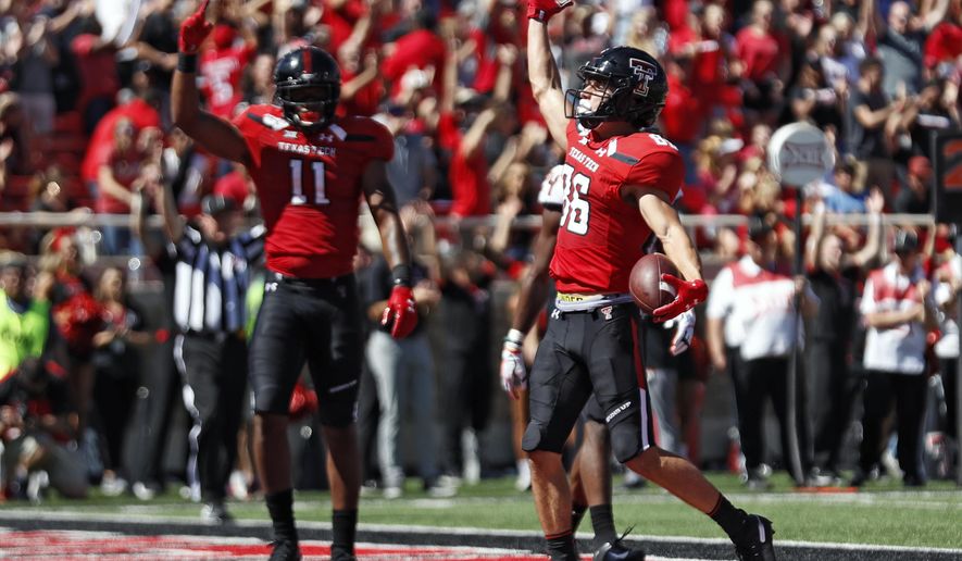 Texas Tech's Dalton Rigdon (86) celebrates after scoring a touchdown during the second half of an NCAA college football game against Oklahoma State, Saturday, Oct. 5, 2019, in Lubbock, Texas. (AP Photo/Brad Tollefson)