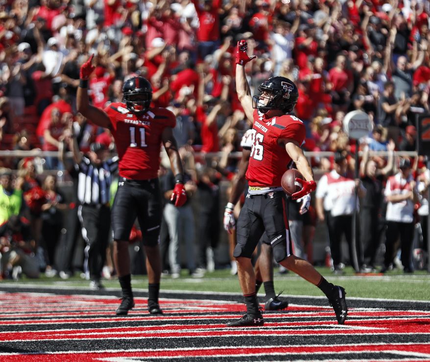 Texas Tech's Dalton Rigdon (86) celebrates after scoring a touchdown during the second half of an NCAA college football game against Oklahoma State, Saturday, Oct. 5, 2019, in Lubbock, Texas. (AP Photo/Brad Tollefson)