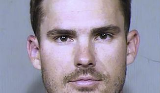 This Oct. 6, 2019, booking photo provided by the Maricopa County Sheriff&#39;s Office in Phoenix shows San Diego Padres pitcher Jacob Nix. Police say Nix was arrested for trying to crawl through the doggie door of a home in the Phoenix suburb of Peoria, Ariz. (Maricopa County Sheriff&#39;s Office via AP)