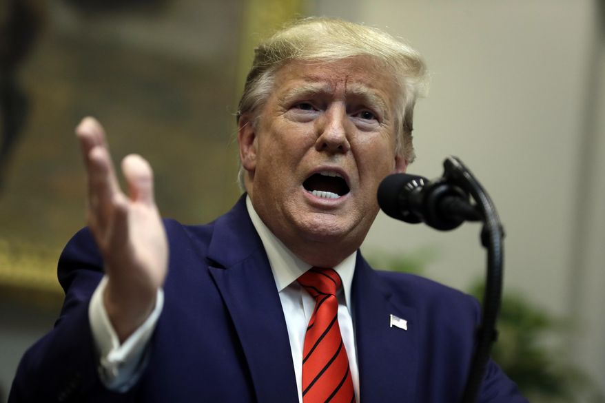 President Donald Trump answers questions from reporters during an event on "transparency in Federal guidance and enforcement" in the Roosevelt Room of the White House, Wednesday, Oct. 9, 2019, in Washington. (AP Photo/Evan Vucci)