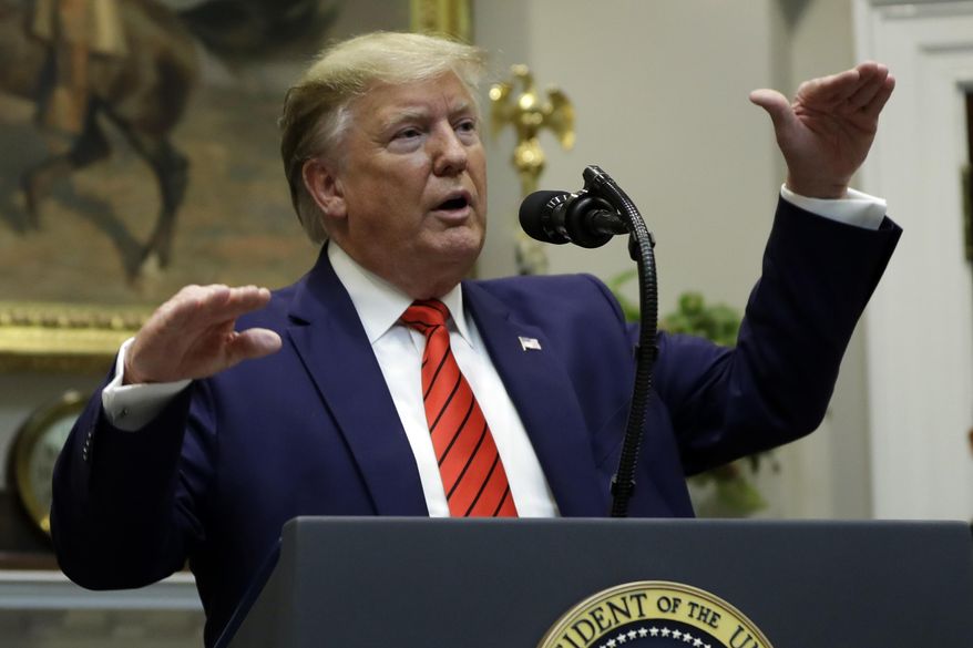 President Donald Trump answers questions from reporters during an event on "transparency in Federal guidance and enforcement" in the Roosevelt Room of the White House, Wednesday, Oct. 9, 2019, in Washington. (AP Photo/Evan Vucci)