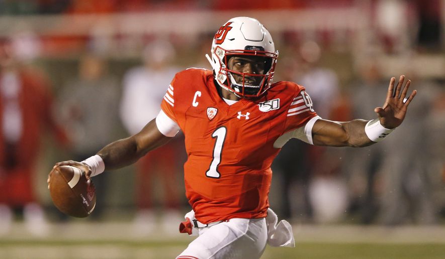 Utah quarterback Tyler Huntley (1) carries the ball in the second half of an NCAA college football game against Washington State Saturday, Sept. 28, 2019, in Salt Lake City. (AP Photo/Rick Bowmer)