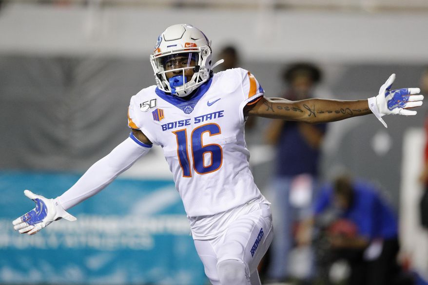 Boise State wide receiver John Hightower celebrates after scoring a touchdown against UNLV during the first half of an NCAA college football game Saturday, Oct. 5, 2019, in Las Vegas. (AP Photo/John Locher)