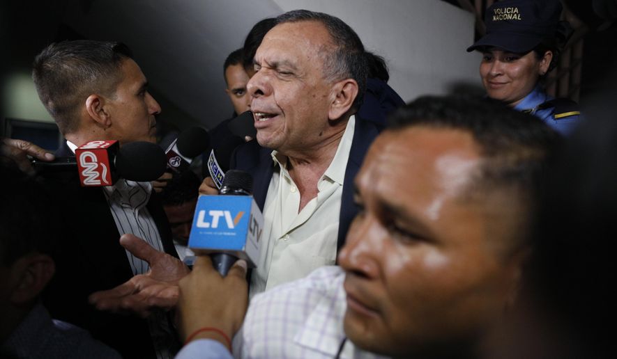 FILE - In this Aug. 20, 2019 file photo, former Honduran President Porfirio Lobo speaks to the press outside court where his wife, former first lady Rosa Elena Bonilla de Lobo, was convicted on corruption charges in Tegucigalpa, Honduras. A former drug boss Devis Leonel Rivera Maradiaga testified in court on Friday, Oct. 11, that he had paid a bit more than half a million dollars to Lobo in exchange for protection from being extradited to the United States. (AP Photo/Elmer Martinez, File)