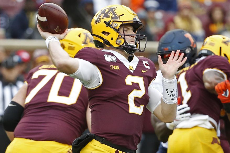 Minnesota quarterback Tanner Morgan (2) passes against Illinois in the first quarter at an NCAA college football game Saturday, Oct. 5, 2019, in Minneapolis. (AP Photo/Bruce Kluckhohn)