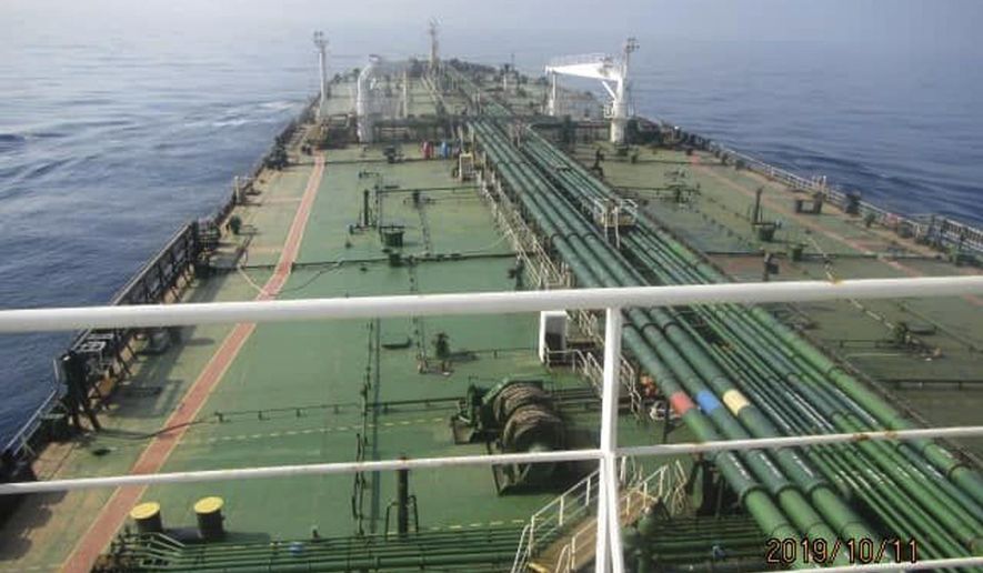This photo released by the official news agency of the Iranian Oil Ministry, SHANA, shows Iranian oil tanker Sabiti traveling through the Red Sea Friday, Oct. 11, 2019. Two missiles struck the Iranian tanker Sabiti traveling through the Red Sea off the coast of Saudi Arabia on Friday, Iranian officials said, the latest incident in the region amid months of heightened tensions between Tehran and the U.S. (SHANA via AP)