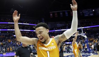 FILE - In this March 16, 2019, file photo, Tennessee guard Lamonte Turner (1) celebrates after making a 3-pointer with 26 seconds remaining to defeat Kentucky 61-59 at the Southeastern Conference Tournament in Nashville, Tenn. Turner has shown a flair for the dramatic for much of his college career while delivering some of the most memorable moments in this program’s recent history. (AP Photo/Mark Humphrey, File)