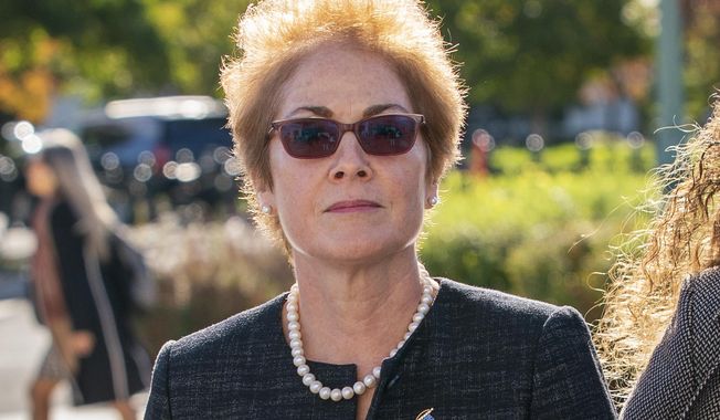 Former U.S. ambassador to Ukraine Marie Yovanovitch, arrives on Capitol Hill, Friday, Oct. 11, 2019, in Washington, as she is scheduled to testify before congressional lawmakers on Friday as part of the House impeachment inquiry into President Donald Trump. (AP Photo/J. Scott Applewhite)