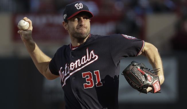 Washington Nationals starting pitcher Max Scherzer during the fourth inning of Game 2 of the baseball National League Championship Series against the St. Louis Cardinals Saturday, Oct. 12, 2019, in St. Louis. (AP Photo/Mark Humphrey)