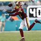 Washington Redskins wide receiver Terry McLaurin (17) grabs a pass, during the second half at an NFL football game against the Miami Dolphins, Sunday, Oct. 13, 2019, in Miami Gardens, Fla. McLaurin scored two touchdowns. The Redkskins defeated the Dolphins 17-16. (AP Photo/Brynn Anderson)