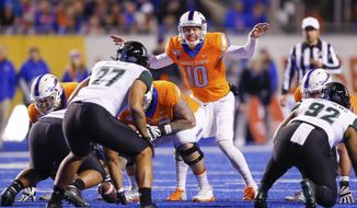 Boise State quarterback Chase Cord (10) calls signals at the line of scrimmage duirng the team&#x27;s NCAA college football game against Hawaii, Saturday, Oct. 12, 2019, in Boise, Idaho. (AP Photo/Steve Conner)