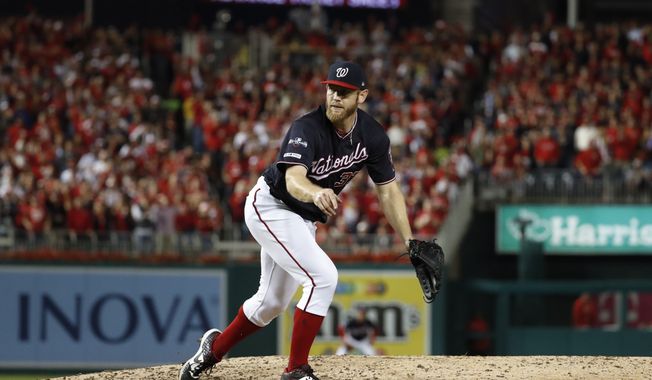 Washington Nationals starting pitcher Stephen Strasburg throws his final pitch during the seventh inning of Game 3 of the baseball National League Championship Series against the St. Louis Cardinals Monday, Oct. 14, 2019, in Washington. (AP Photo/Jeff Roberson)
