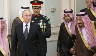 Russian President Vladimir Putin, center left, and Saudi Arabia&#39;s King Salman, right, attend the official welcome ceremony in Riyadh, Saudi Arabia, Monday, Oct. 14, 2019. Putin traveled to Saudi Arabia on Monday, meeting with the oil-rich nation&#39;s king and crown prince as he seeks to cement Moscow&#39;s political and energy ties across the Mideast. (AP Photo/Alexander Zemlianichenko, Pool)  **FILE**