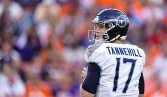 Tennessee Titans quarterback Ryan Tannehill looks to throw a pass during the second half of an NFL football game against the Denver Broncos, Sunday, Oct. 13, 2019, in Denver. (AP Photo/Jack Dempsey)
