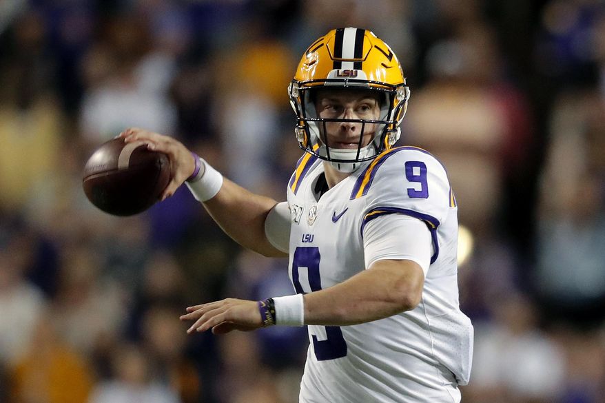 FILE - In this Oct. 12, 2019, file photo, LSU quarterback Joe Burrow (9) passes in the second half of an NCAA college football game against Florida, in Baton Rouge, La. Burrow was selected to the AP Midseason All-America NCAA college football team, Tuesday, Oct. 15, 2019. (AP Photo/Gerald Herbert)