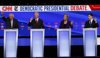 Democratic presidential candidate Sen. Bernie Sanders, I-Vt., from left, former Vice President Joe Biden, Sen. Elizabeth Warren, D-Mass., and South Bend Mayor Pete Buttigieg all gesture to speak during a Democratic presidential primary debate hosted by CNN/New York Times at Otterbein University, Tuesday, Oct. 15, 2019, in Westerville, Ohio. (AP Photo/John Minchillo)