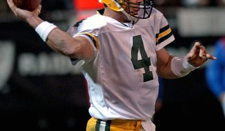 FILE In this Dec. 22, 2003, file photo, Green Bay Packers quarterback Brett Favre throws a pass against the Oakland Raiders in the second quarter of an NFL football game in Oakland, Calif. When it comes to emotional games, his four-touchdown against the Raiders the day after his father’s death in 2003 stands out above all the rest.  (AP Photo/Paul Sakuma, File)