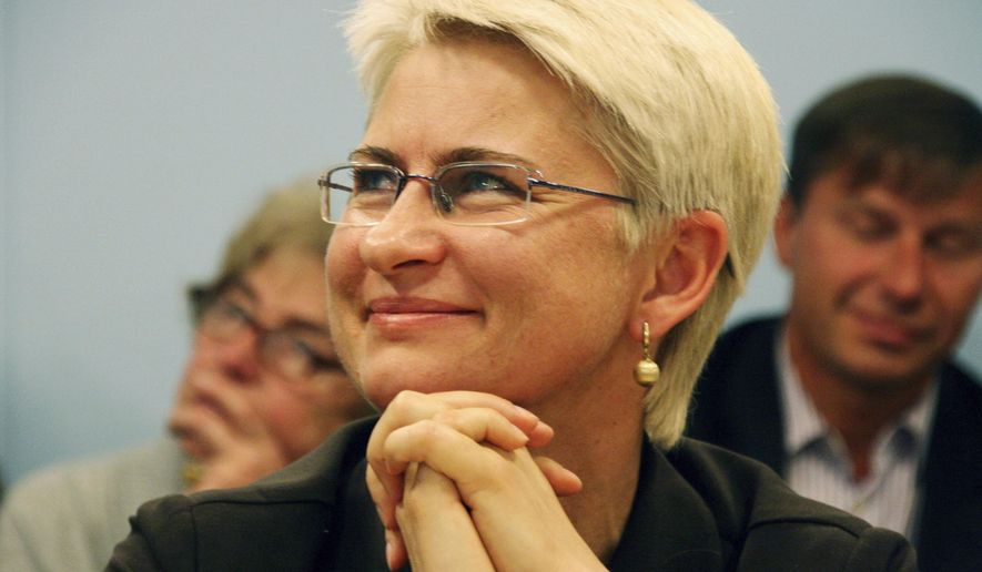 FILE - This 2012 file photo provided by Juozas Valiusaitis shows Neringa Venckiene in Lithuania. Authorities say they are proceeding with the extradition of the former Lithuanian judge and parliamentarian jailed in Chicago after the U.S. Supreme Court refused to hear her appeal. A court filing Tuesday, Oct. 15, 2019, by the U.S. attorney’s office in Chicago says there are no longer any hurdles to extraditing Venckiene. (Courtesy of Juozas Valiusaitis via AP, File)