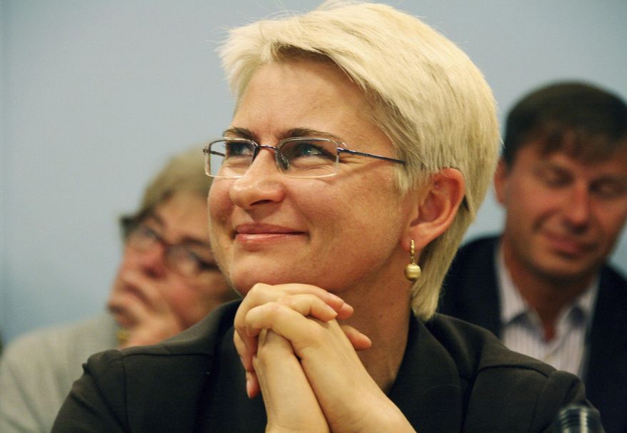 FILE - This 2012 file photo provided by Juozas Valiusaitis shows Neringa Venckiene in Lithuania. Authorities say they are proceeding with the extradition of the former Lithuanian judge and parliamentarian jailed in Chicago after the U.S. Supreme Court refused to hear her appeal. A court filing Tuesday, Oct. 15, 2019, by the U.S. attorney’s office in Chicago says there are no longer any hurdles to extraditing Venckiene. (Courtesy of Juozas Valiusaitis via AP, File)