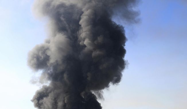 Oil storage facility tanks burn in Crockett, Calif. on Tuesday, Oct. 15, 2019. Emergency sirens blared and thick plumes of black smoke and flames filled the skyline around the NuStar Energy LP facility in Crockett, about 30 miles northeast of San Francisco. "This is a very dynamic, rapidly evolving situation," Capt. George Laing of the Contra Costa Fire Department said. (Anda Chu/San Jose Mercury News via AP)