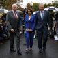 Speaker of the House Nancy Pelosi of Calif., center, Senate Minority Leader Sen. Chuck Schumer of N.Y., right, and House Majority Leader Steny Hoyer of Md., walk from the microphones after speaking with reporters following a meeting with President Donald Trump at the White House, Wednesday, Oct. 16, 2019, in Washington. (AP Photo/Evan Vucci)