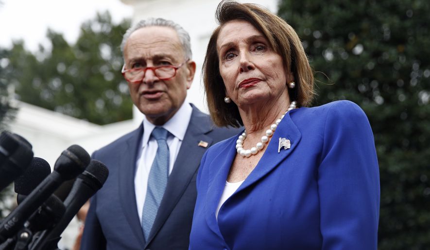 House Speaker Nancy Pelosi of Calif., right, speaks with members of the media alongside Senate Minority Leader Sen. Chuck Schumer of N.Y., outside of the West Wing of the White House after a meeting with President Donald Trump, Wednesday, Oct. 16, 2019, in Washington. (AP Photo/Patrick Semansky)