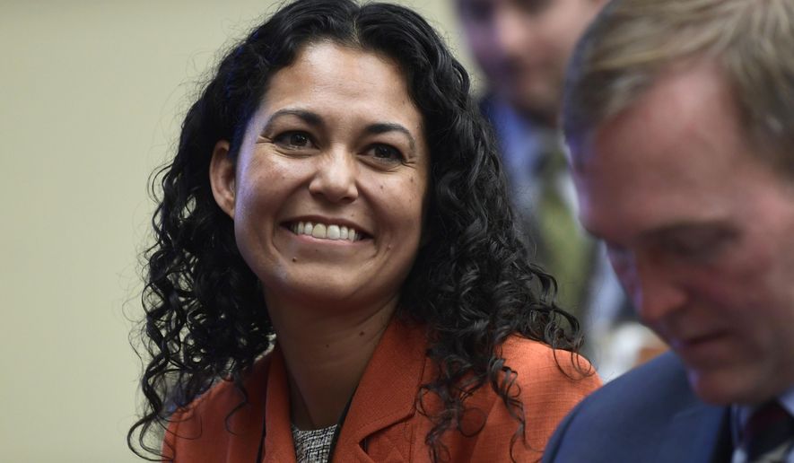 FILE - In this Nov. 30, 2018,file photo, Rep.-elect Xochitl Torres Small, D-N.M., reacts after drawing her number during the member-elect room lottery draw on Capitol Hill in Washington. Torres Small continues to out-raise her Republican opponents in southern New Mexico's closely watched U.S. House race, according to federal campaign finance reports released Tuesday, Oct. 15, 2019. (AP Photo/Susan Walsh, File)