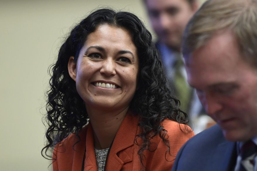 FILE - In this Nov. 30, 2018,file photo, Rep.-elect Xochitl Torres Small, D-N.M., reacts after drawing her number during the member-elect room lottery draw on Capitol Hill in Washington. Torres Small continues to out-raise her Republican opponents in southern New Mexico's closely watched U.S. House race, according to federal campaign finance reports released Tuesday, Oct. 15, 2019. (AP Photo/Susan Walsh, File)