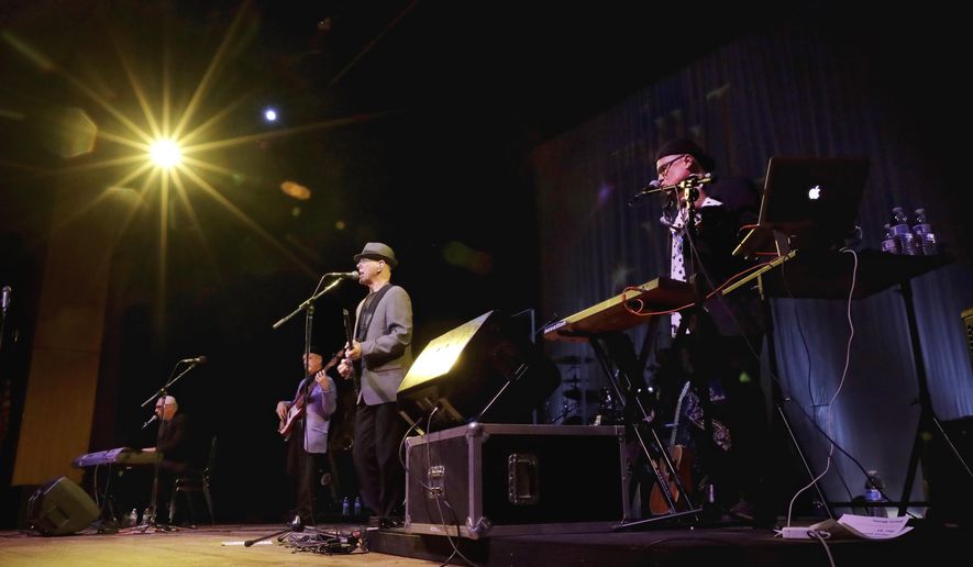 FILE - In this July 20, 2017 file photo, The Hit Men play music during a show at the Axelrod Performing Arts Center, in Deal Park, N.J. The Musicians Hall of Fame and Museum in Nashville is giving The Hit Men its &amp;quot;Road Warriors&amp;quot; award later this month. The group will play a concert in Nashville on Oct. 28, 2019. (AP Photo/Julio Cortez, File)