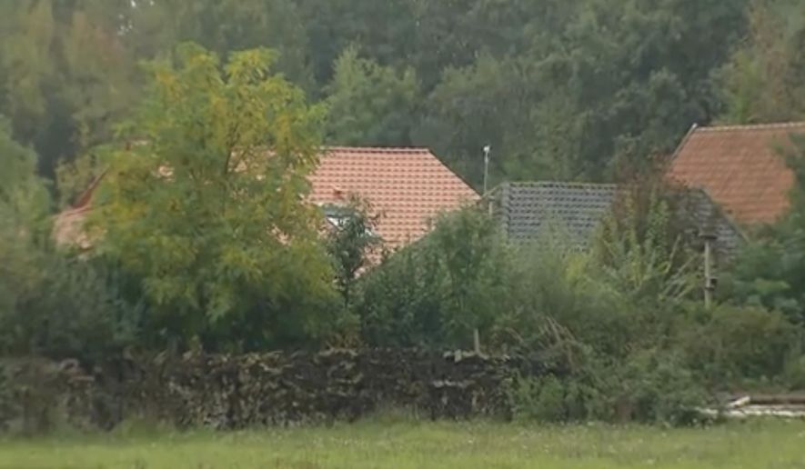 The small group of buildings after a family group were discovered to be living in secluded conditions in Ruinerwold, 130 kilometers (80 miles) northeast of Amsterdam, Netherlands, Tuesday Oct. 15, 2019. Dutch authorities were Tuesday trying to piece together the story of a six-member family group believed to have lived for nine years on a farm, isolated from the outside world in the rural east of the Netherlands. (RTL Netherlands via AP)