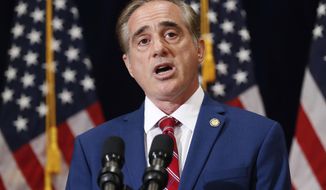 FILE - In tjhis Aug. 2017 file photo then Veterans Affairs Secretary David Shulkin speaks during a press briefing in Bridgewater, N.J. The book by former VA Secretary David Shulkin, obtained by The Associated Press, describes a March 6, 2017, conversation in the Oval Office where the president explored ways in which the administration could act quickly in shuttering the government-run VA medical centers that he viewed as poorly performing. (AP Photo/Pablo Martinez Monsivais)