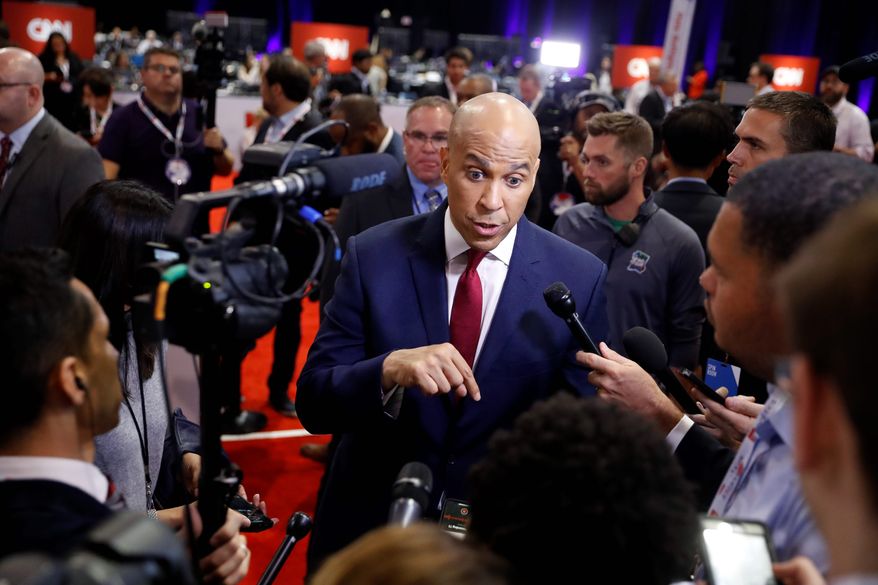 "Often when we talk about gun violence, the discussion focuses on deadly mass shootings, but in my neighborhood in Newark and urban cities across the country people are experiencing this on a daily basis," Sen. Cory A. Booker said about his gun violence legislation. (Associated Press)