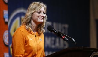 Tennessee head coach Kellie Harper speaks during the Southeastern Conference NCAA college basketball media day, Thursday, Oct. 17, 2019, in Birmingham, Ala. (AP Photo/Butch Dill)