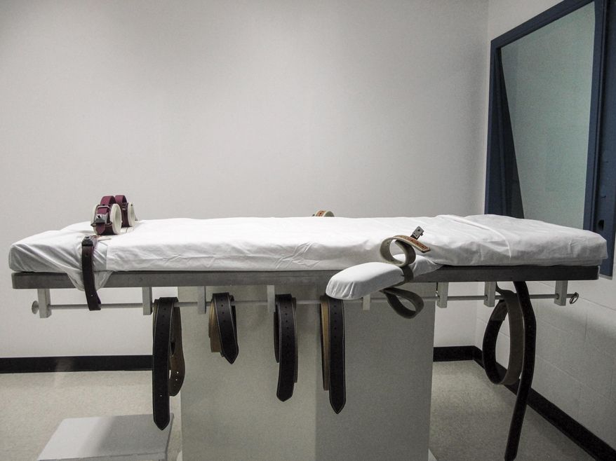 This July 7, 2010 file photo shows Nebraska's lethal injection chamber at the State Penitentiary in Lincoln, Neb. On April 1, 2020, the Texas Court of Criminal Appeals ordered a 60-day delay of the scheduled April 23 execution of convicted murderer Fabian Hernandez. It is the third such scheduled execution in the Lone Star State to face delays during the ongoing coronavirus outbreak, although the COVID-19 pandemic was not explicitly cited as the court's rationale. (AP Photo/Nate Jenkins, File)