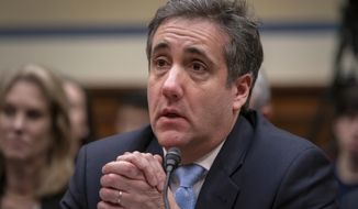 FILE - In this Wednesday, Feb. 27, 2019, file photo, Michael Cohen, President Donald Trump&#39;s former personal lawyer, reacts as he finishes a day of testimony to the House Oversight and Reform Committee, on Capitol Hill in Washington. Michael Cohen is again turning to Congress as part of a new bid to reduce his prison sentence. President Donald Trump&#39;s former attorney and fixer asked the heads of three Congressional committees last month to intervene on his behalf. (AP Photo/J. Scott Applewhite, File)