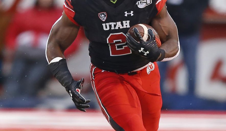 Utah running back Zack Moss (2) carries the ball during the first half of an NCAA college football game against Arizona State on Saturday, Oct. 19, 2019, in Salt Lake City. (AP Photo/Rick Bowmer)