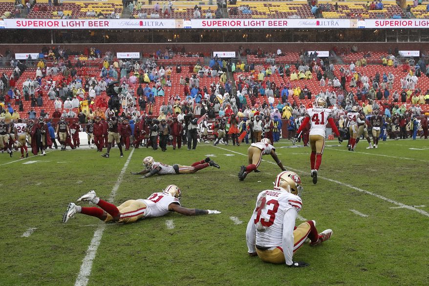 Members of the San Francisco 49ers celebrate after an NFL football game against the Washington Redskins, Sunday, Oct. 20, 2019, in Landover, Md. San Francisco won 9-0. (AP Photo/Alex Brandon)