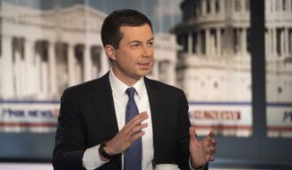Democratic presidential candidate South Bend Mayor Pete Buttigieg is interviewed by FOX News Sunday anchor Chris Wallace, Sunday morning, Oct. 20, 2019, in Washington. (AP Photo/Kevin Wolf)
