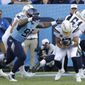 Tennessee Titans defensive lineman Jeffery Simmons (98) sacks Los Angeles Chargers quarterback Philip Rivers (17) for a 3-yard loss in the second half of an NFL football game Sunday, Oct. 20, 2019, in Nashville, Tenn. (AP Photo/James Kenney)