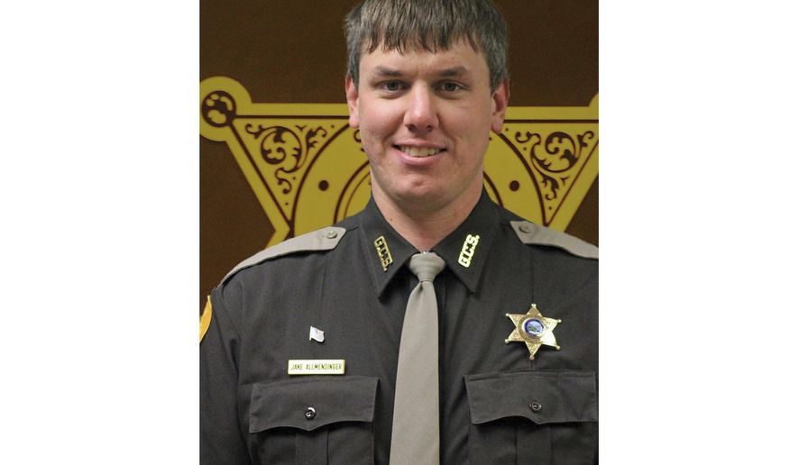 This undated photo released by Gallatin County Sheriff's Office shows deputy Jake Allmendinger. Authorities say the Montana county deputy has been killed in a vehicle accident on an icy mountain road while responding to a report of a stranded vehicle. The Bozeman Daily Chronicle reports 31-year-old Deputy Allmendinger died Saturday, Oct. 19, 2019, in Bozeman. (Gallatin County Sheriff's Office vis AP)