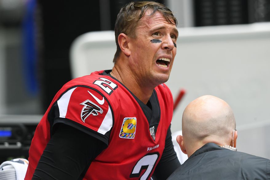Atlanta Falcons quarterback Matt Ryan reacts as medical personel attend to him after injury against the Los Angeles Rams during the second half of an NFL football game, Sunday, Oct. 20, 2019, in Atlanta. (AP Photo/John Amis)