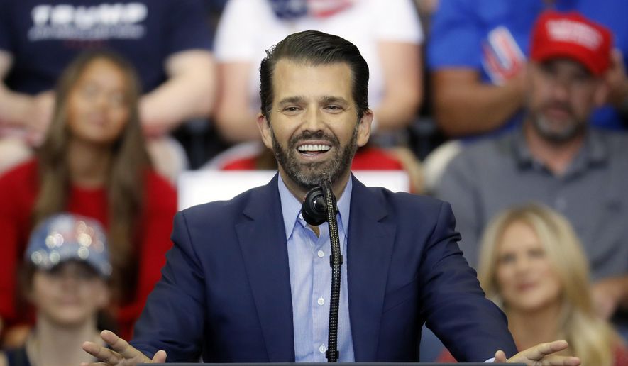 In this Aug. 1, 2019, file photo, Donald Trump Jr. speaks before the arrival of President Donald Trump at a campaign rally at U.S. Bank Arena in Cincinnati. (AP Photo/John Minchillo, File)