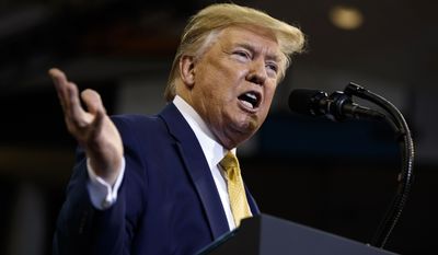 President Donald Trump speaks during a campaign rally at the Lake Charles Civic Center, Friday, Oct. 11, 2019, in Lake Charles, La. (AP Photo/Evan Vucci)