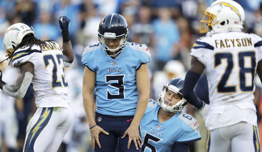 Tennessee Titans kicker Cody Parkey (3) reacts to missing an extra point by hitting the right upright in the second half of an NFL football game against the Los Angeles Chargers Sunday, Oct. 20, 2019, in Nashville, Tenn. (AP Photo/James Kenney)