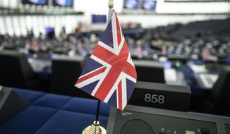 The Union Jack is seen Tuesday, Oct. 22, 2019 at the European Parliament in Strasbourg. Britain faces another week of political gridlock after British lawmakers on Monday denied Prime Minister Boris Johnson a chance to hold a vote on the Brexit divorce bill agreed in Brussels last Thursday. (AP Photo/Jean-Francois Badias)