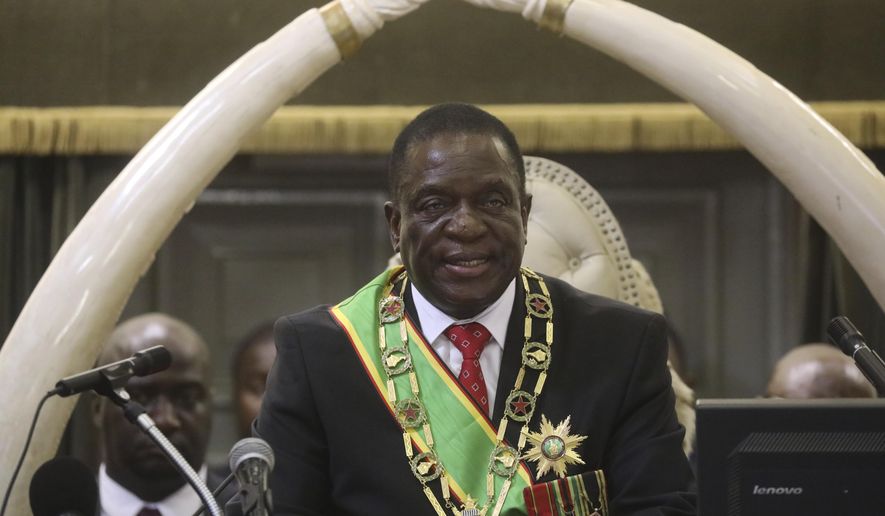 FILE - In this Tuesday Oct. 1, 2019 file photo Zimbabwean President Emmerson Mnangagwa delivers his State of the nation address at the opening session of parliament in Harare. Zimbabwe has declared a new public holiday to protest U.S sanctions it says are hurting its economy, and the day comes with a state-sponsored festival. The government says Anti-Sanctions Day will be commemorated on Friday. Dozens of Zimbabwean officials, including President Emmerson Mnangagwa, have faced years of U.S. sanctions over alleged human rights violations. Mnangagwa has turned the sanctions into a rallying cry. (AP Photo/Tsvangirayi Mukwazhi, file)